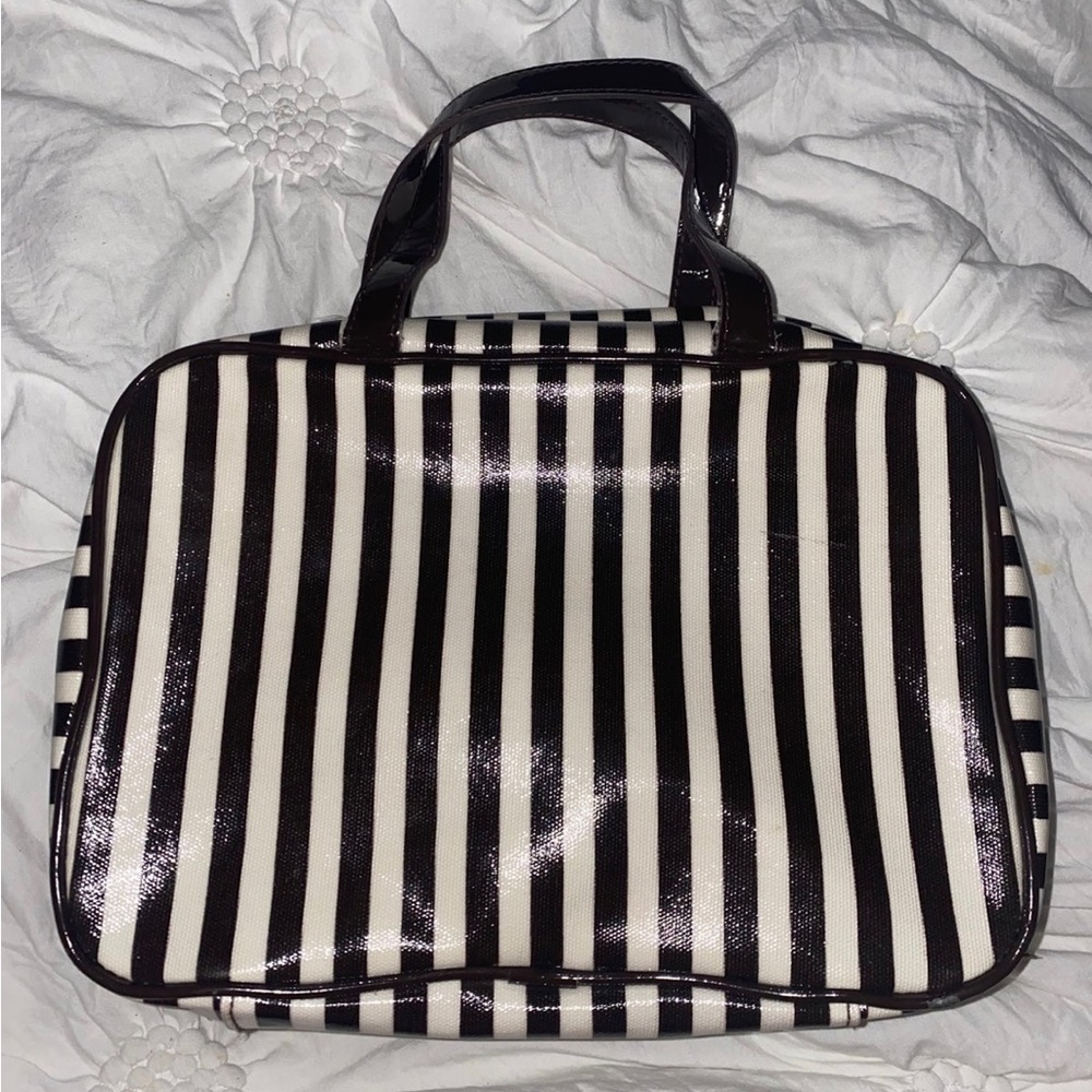 Retired Henri Bendel cosmetic bag. Gentle used.